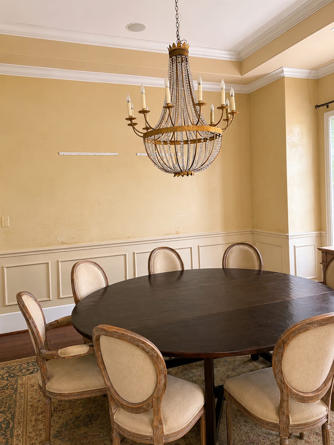 Houston dining room with dated golden-yellow walls before interior painting